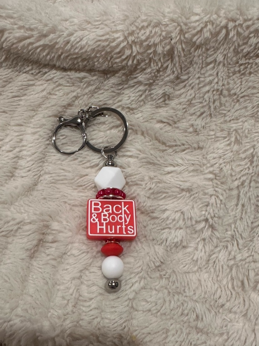 Back & Body Hurts Red and White Beaded Keychain